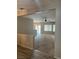 Open concept living room with carpet, a ceiling fan, and abundant natural light at 6092 Fox Creek Ave, Las Vegas, NV 89122