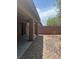 Cozy covered patio with access to low maintenance backyard at 6092 Fox Creek Ave, Las Vegas, NV 89122