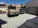 Backyard featuring parked trucks, shed, concrete, and a walled-in yard at 6248 Sapporo Cir, Las Vegas, NV 89110