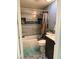 Cozy bathroom with tub, tile shower, decorative tile floor, and marble countertop vanity at 6248 Sapporo Cir, Las Vegas, NV 89110