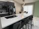 Modern kitchen featuring a large island, sleek cabinetry, and stainless steel appliances at 6248 Sapporo Cir, Las Vegas, NV 89110