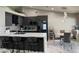 Bright kitchen with a large island, sleek cabinets, dining area, and modern appliances at 6248 Sapporo Cir, Las Vegas, NV 89110