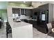Modern kitchen with quartz countertops, sleek cabinetry, and stainless steel appliances at 6248 Sapporo Cir, Las Vegas, NV 89110
