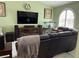 Comfortable living room with marble floors, a vaulted ceiling, and stylish decor at 6248 Sapporo Cir, Las Vegas, NV 89110