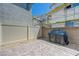Private backyard featuring a stone-paved patio, perfect for outdoor entertaining and grilling at 6940 Crescent Gold St, North Las Vegas, NV 89086