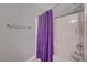 Bathroom featuring a shower with a purple curtain at 6940 Crescent Gold St, North Las Vegas, NV 89086
