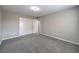 Neutral bedroom with closet and neutral carpet at 7095 Mountain Den Ave, Las Vegas, NV 89179