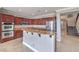 Spacious kitchen with stainless steel appliances, granite countertops, and center island at 7095 Mountain Den Ave, Las Vegas, NV 89179