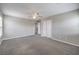 Spacious main bedroom with a ceiling fan and walk-in closet at 7095 Mountain Den Ave, Las Vegas, NV 89179