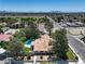 Aerial view of a desert home, revealing a private pool and spacious backyard at 7460 Buckskin Ave, Las Vegas, NV 89129