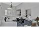 Inviting living room with stylish furniture, elegant lighting, and tile floors at 7738 Willow Cove Cir, Las Vegas, NV 89129