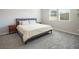 Serene bedroom with a comfortable bed, neutral tones, and natural light from the window at 832 Canonbury St, Henderson, NV 89011