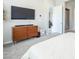 Bedroom featuring carpeted floors, a wooden dresser and ensuite bath at 832 Canonbury St, Henderson, NV 89011