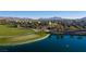 Picturesque community lake with green spaces, walking trails, and tranquil views at 832 Canonbury St, Henderson, NV 89011