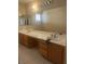 Bathroom featuring dual sinks and countertop at 9365 Sparkling Waters Ave, Las Vegas, NV 89129
