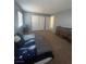 Spacious bedroom with neutral walls, carpet, and closet at 9365 Sparkling Waters Ave, Las Vegas, NV 89129
