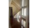 Entryway features hardwood floors, soaring ceilings, and a staircase leading to the second floor at 9365 Sparkling Waters Ave, Las Vegas, NV 89129