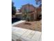 Charming two-story home features a well-manicured front yard and a spacious three-car garage at 9365 Sparkling Waters Ave, Las Vegas, NV 89129