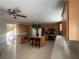 Spacious kitchen with stainless steel appliances and center island with bar stool seating at 9365 Sparkling Waters Ave, Las Vegas, NV 89129