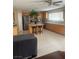 Spacious kitchen with stainless steel appliances, an island, and ample cabinet space at 9365 Sparkling Waters Ave, Las Vegas, NV 89129