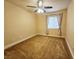 Standard bedroom with carpet, a ceiling fan, and a single window at 9462 Alhambra Valley St, Las Vegas, NV 89178