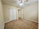 Bedroom with neutral walls, carpet, and a double closet at 9462 Alhambra Valley St, Las Vegas, NV 89178