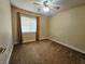 Bedroom featuring carpet, a window with curtains, and neutral walls at 9462 Alhambra Valley St, Las Vegas, NV 89178