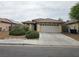 Charming single-story home with a well-maintained front yard and a two-car garage at 9462 Alhambra Valley St, Las Vegas, NV 89178