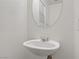 Well-lit powder room featuring a modern sink and neutral decor at 9535 Stills Way, Las Vegas, NV 89148