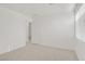 Bright and airy bedroom with carpet and a window at 9535 Stills Way, Las Vegas, NV 89148