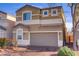 Charming two-story home with desert landscaping and a spacious two-car garage at 9535 Stills Way, Las Vegas, NV 89148