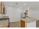 Well-appointed kitchen with stainless steel appliances, granite countertops, and ample cabinet space at 9535 Stills Way, Las Vegas, NV 89148