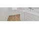 Functional laundry room with modern appliances and wood-look flooring at 9535 Stills Way, Las Vegas, NV 89148