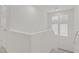 Bright stairwell featuring neutral walls and plush carpeted stairs at 9535 Stills Way, Las Vegas, NV 89148