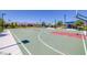Well-maintained community basketball court with hoops and ample space for sports activities at 9876 Heather Moore Ave, Las Vegas, NV 89166