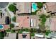 A top-down aerial view showcases a backyard oasis, complete with a sparkling pool, mature trees, and covered patio at , North Las Vegas, NV 89084