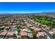 Vast aerial shot highlighting a residential neighborhood near a green space at , North Las Vegas, NV 89084