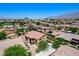 Aerial view of a beautiful home with a red tile roof in a well-maintained neighborhood at , North Las Vegas, NV 89084