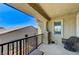 Relaxing covered balcony with a chair and views of the neighborhood at , North Las Vegas, NV 89084