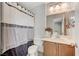 Neutral designed bathroom with a shower and a connecting door to the bedroom at , North Las Vegas, NV 89084