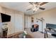 Bedroom featuring two closets, carpet floors, and a ceiling fan at , North Las Vegas, NV 89084