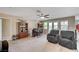 Spacious bonus room featuring a bar, comfortable seating, and natural light at , North Las Vegas, NV 89084