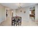 Open dining area featuring a chandelier, seating for four, and neutral paint tones at , North Las Vegas, NV 89084