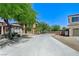 Wide shot view of a home's driveway and desert landscaping surrounding a two-story house at , North Las Vegas, NV 89084