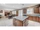 Open kitchen featuring granite counters, tile floors, and a view of the dining and living area at , North Las Vegas, NV 89084