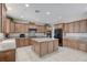Modern kitchen featuring granite countertops, an island, and ample cabinet space with tile flooring at , North Las Vegas, NV 89084
