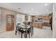 Spacious kitchen featuring granite countertops, stainless steel appliances, and adjacent dining area at , North Las Vegas, NV 89084