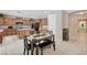 Well-equipped kitchen with granite countertops, central island, and adjoining dining area at , North Las Vegas, NV 89084