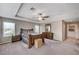 Spacious main bedroom with carpet floors, ceiling fan, and doors to the backyard at , North Las Vegas, NV 89084