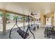 Relax on the spacious covered patio with a swing and seating at , North Las Vegas, NV 89084
